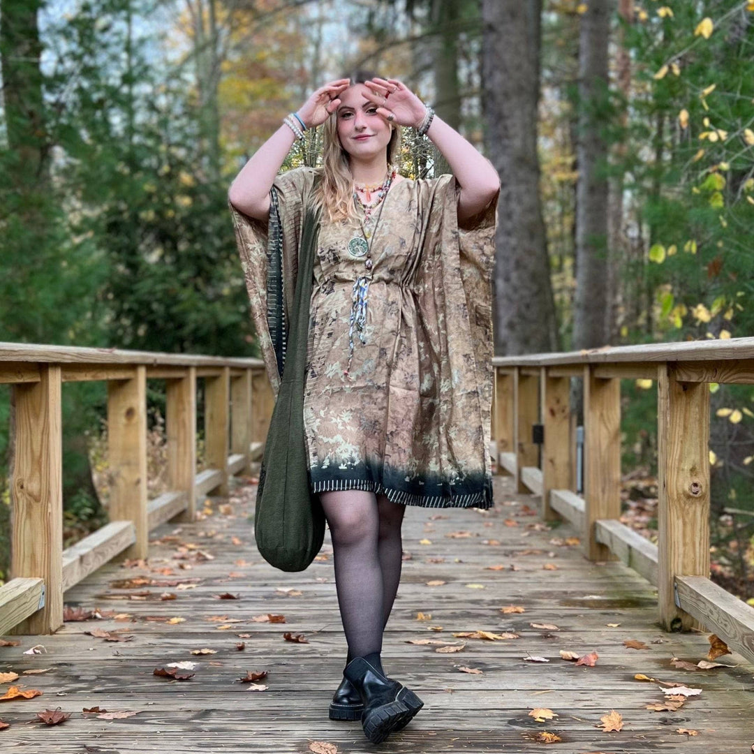 Woman wearing grey-ish tone aanya short kaftan