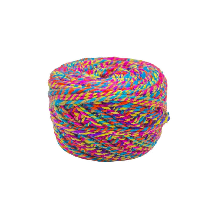 Multicolor yarn ball, side view, dense and compact.