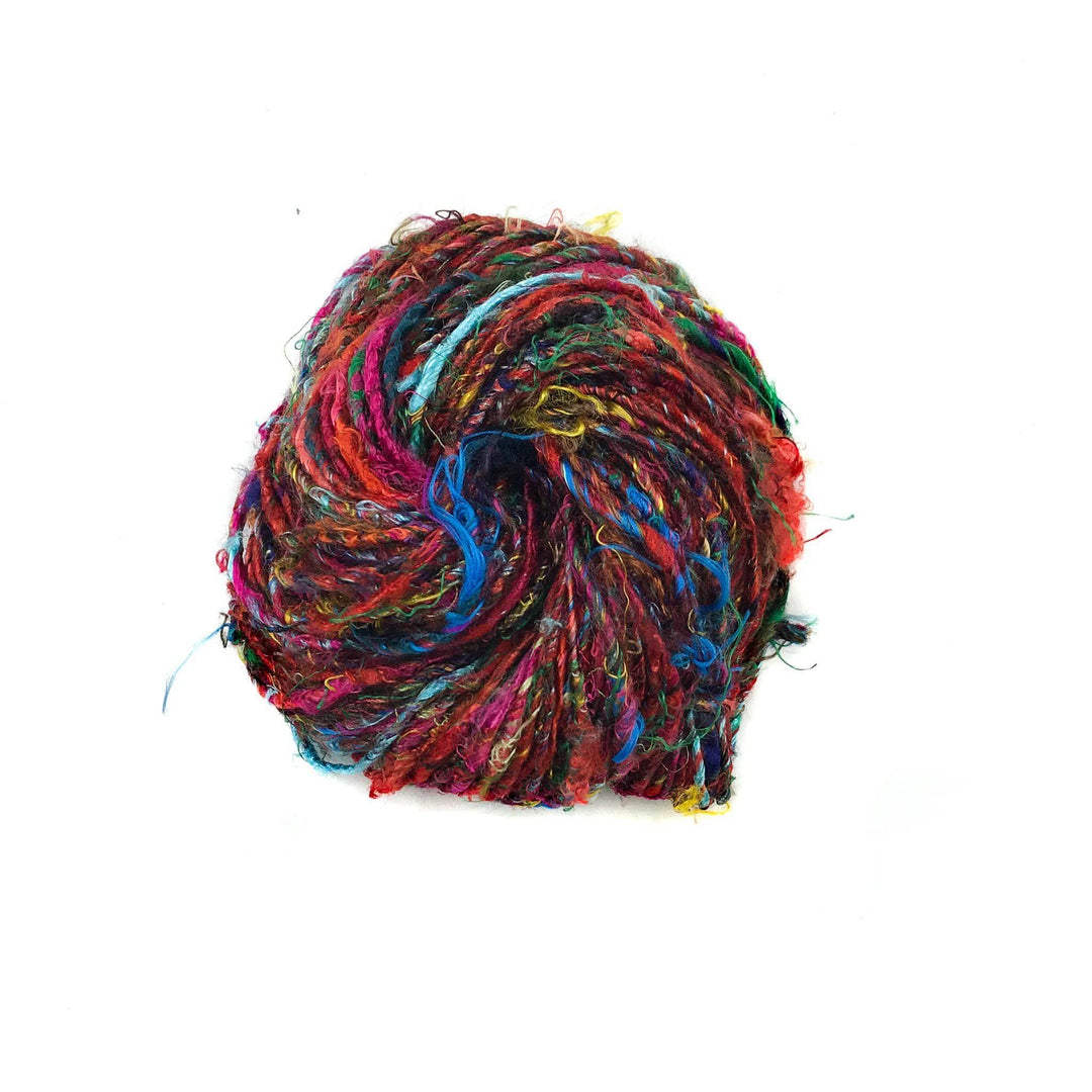 Banana Fiber Yarn donut ball in Kaleidoscope (multicolor) on a white background