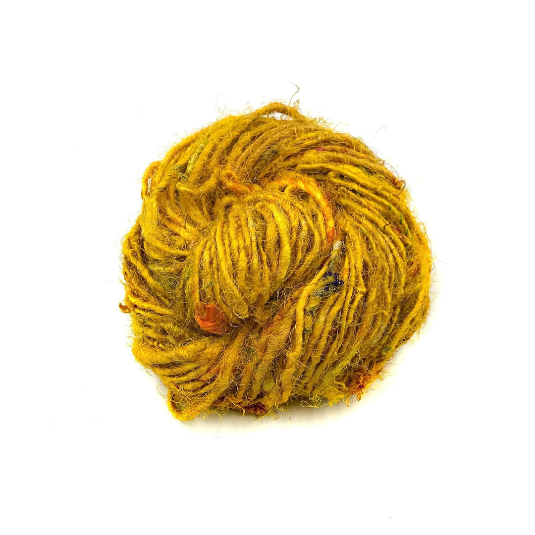 Banana Fiber Yarn donut ball in Sunflower on a white background