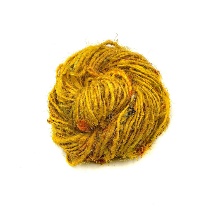 Banana Fiber Yarn donut ball in Sunflower on a white background