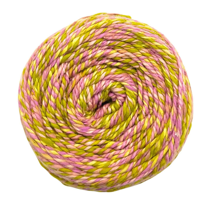 Yarn ball with pink and green swirls, smooth texture.