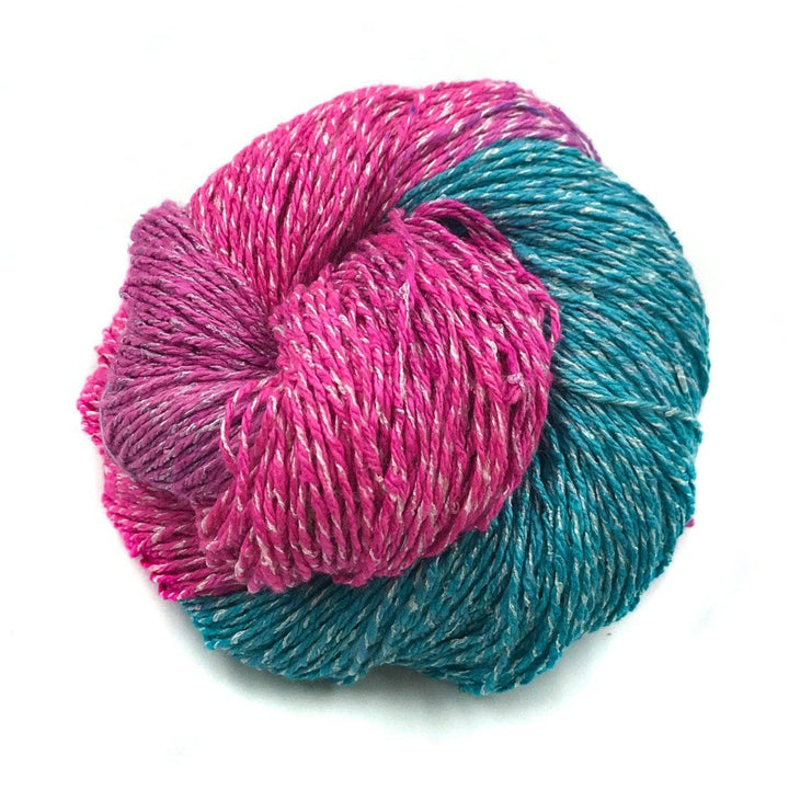 a skein of pink and blue on a white background