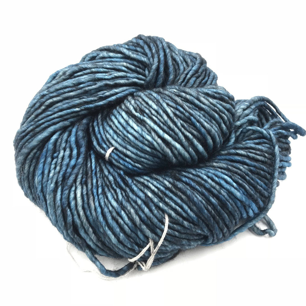 close up of yarn  in the color persia (blue)