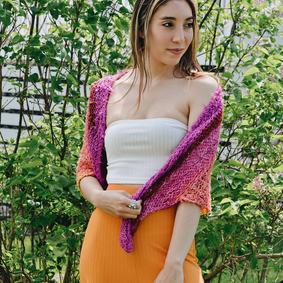 front view of model wearing banana fiber knit shawl.
