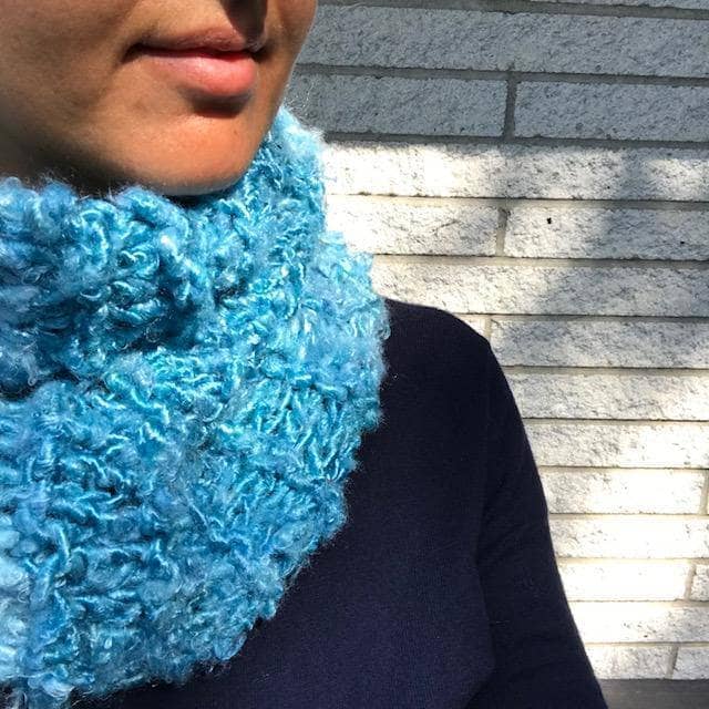 Close up of woman weearing The Ocean Waves Cowl in Sea Mist (blue)