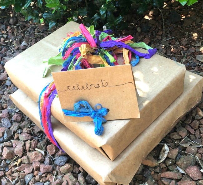 Recycled Gift Wrap with Sari Ribbon Yarn Bows - Darn Good Yarn
