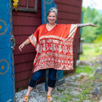 woman wearing red short tunic
