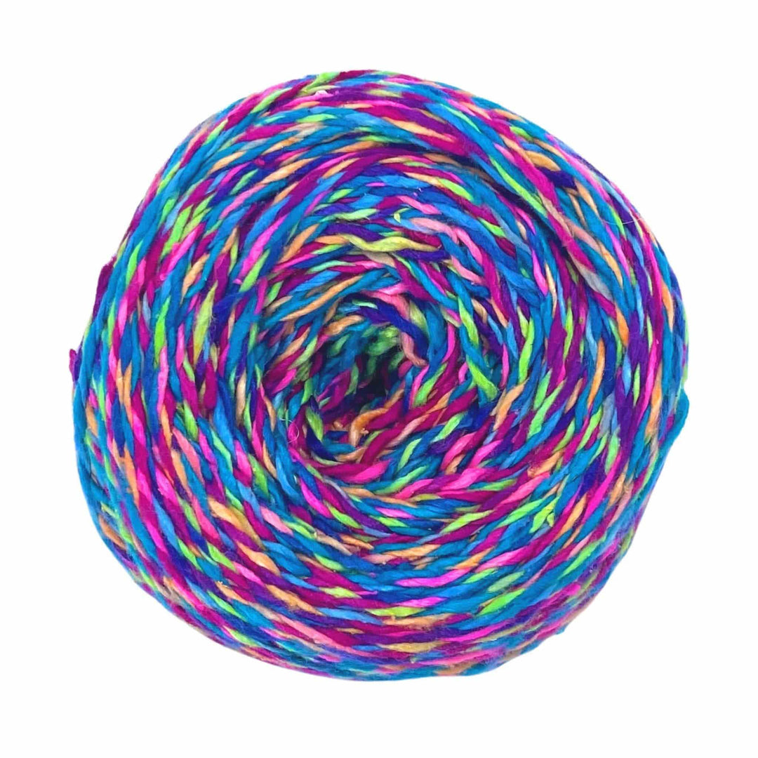A colorful rolled lace weight yarn.