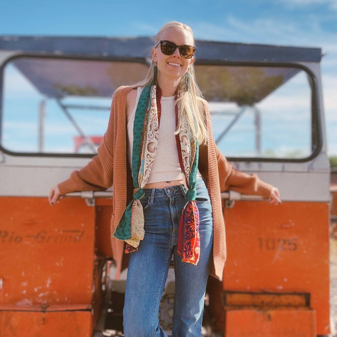 Woman wearing medley scarf around her neck