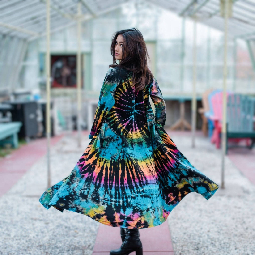 A woman wearing a cotton tie dye long cardigan.