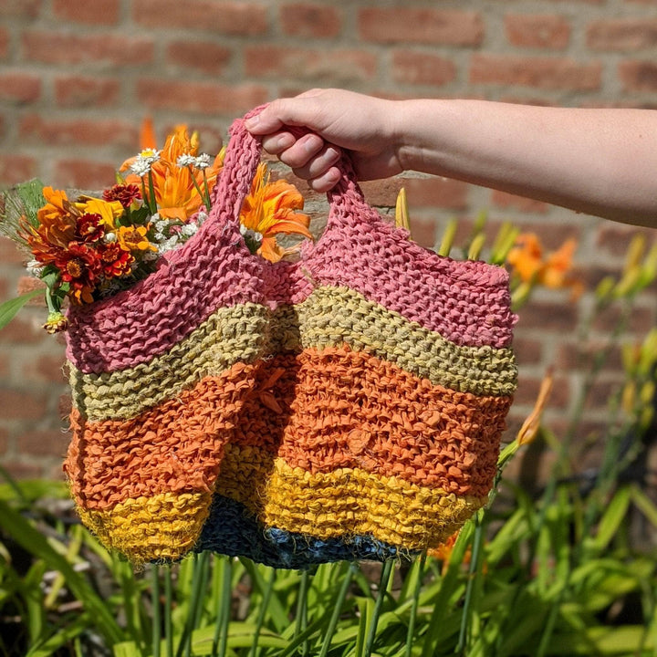 a colorful bag being held outside