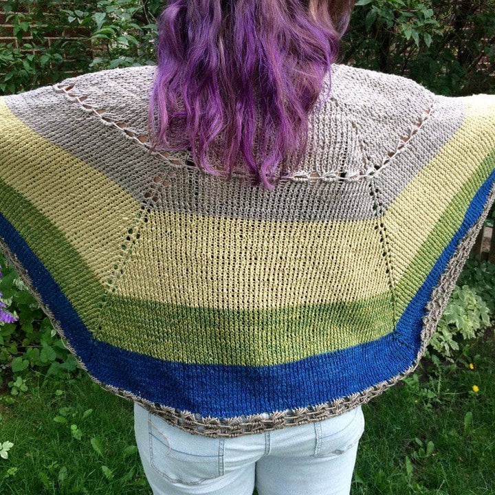 woman wearing a Herbal Sunrise Shawl outdoors