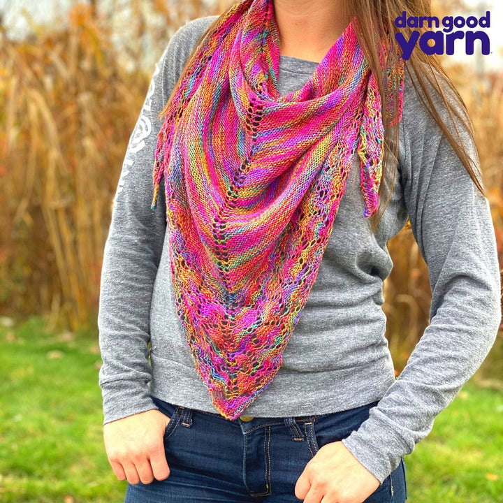 womn wearing rainbow colored shawl