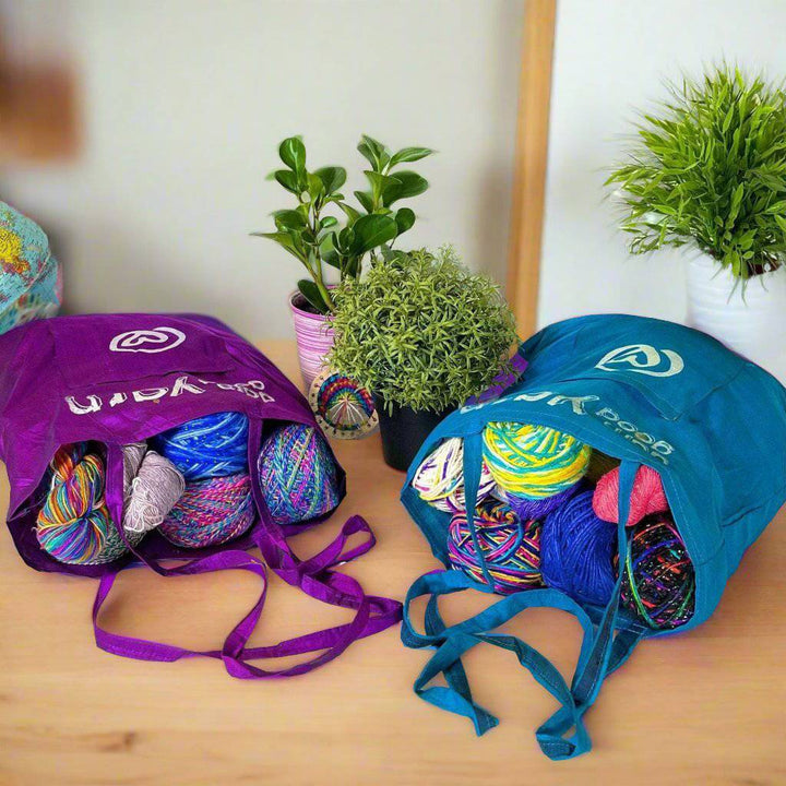 Darn good yarn eco bags full of yarns.
