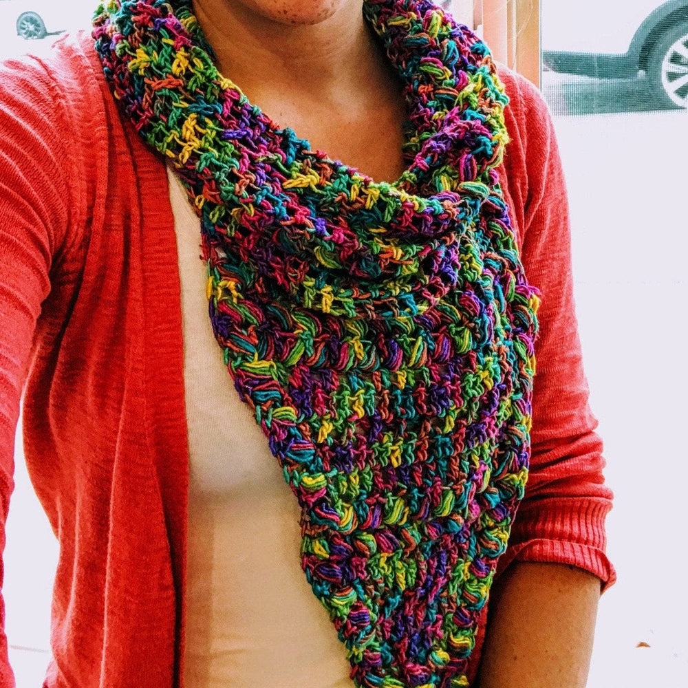 women wearing a rainbow cowl inside