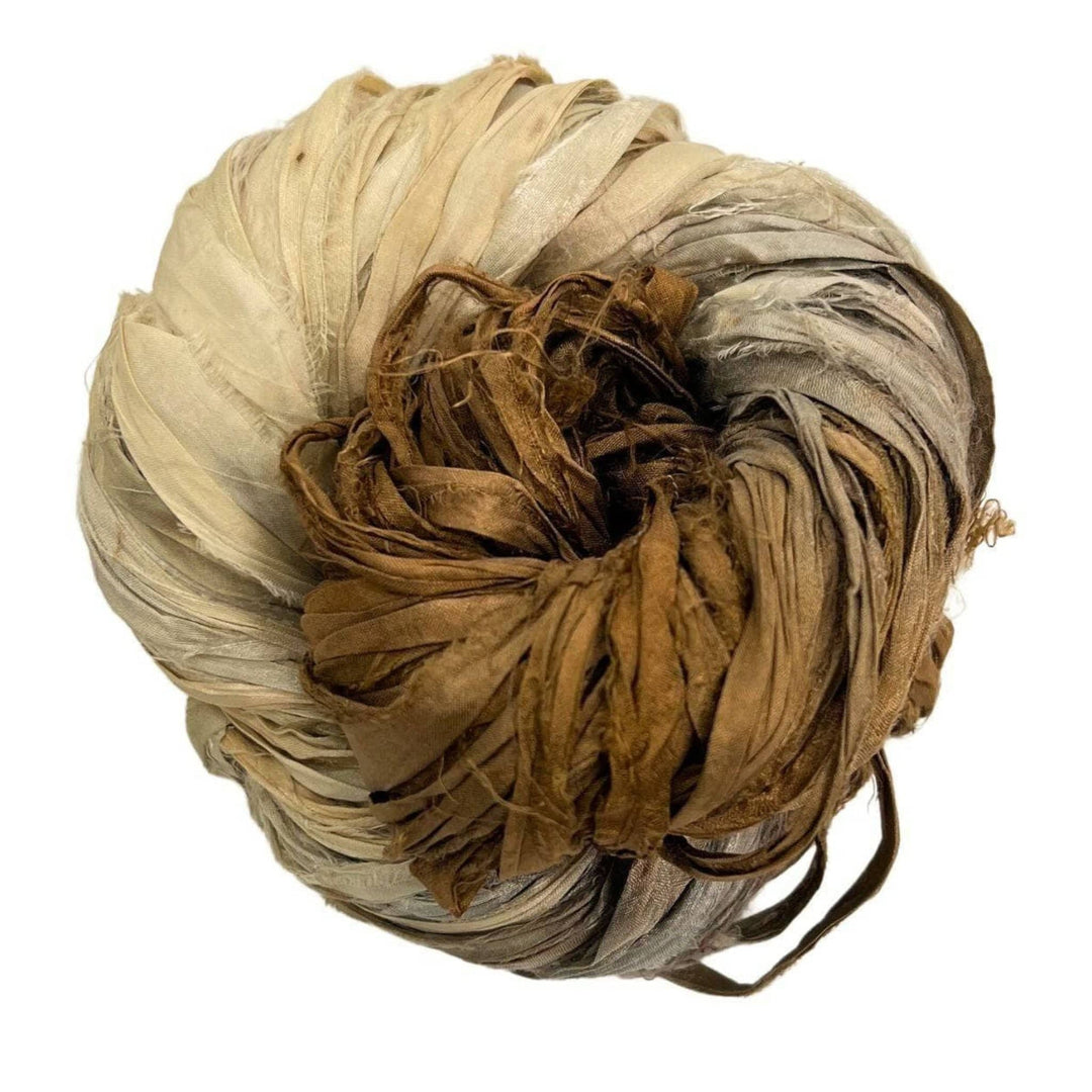 A used brown sari silk Yarn rolled.