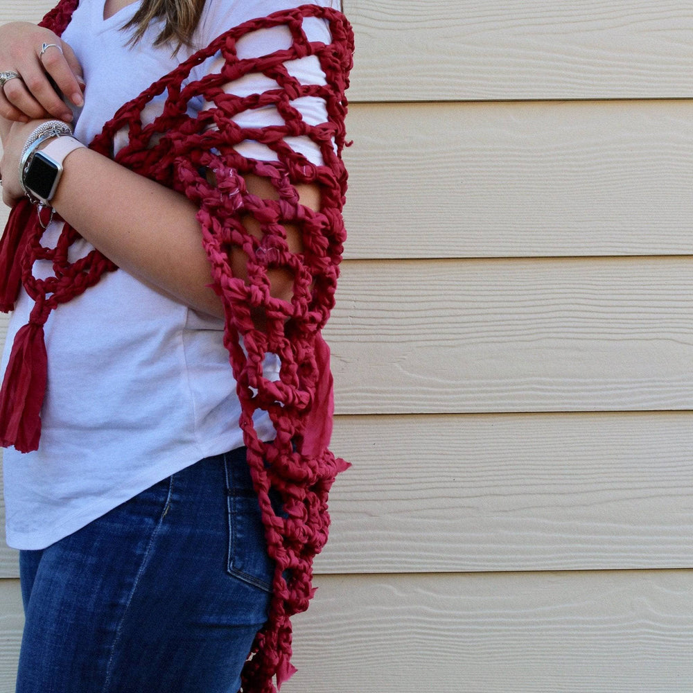 Woman wearing Summer Nights Chiffon Crochet Shawl in front of a beige wall