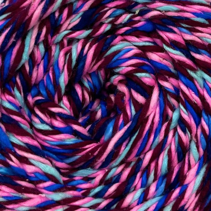 Close up of a triple color twisted weight Yarn.