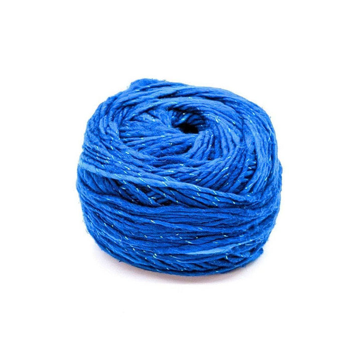 A cake of sparkle blue yarn on a white background