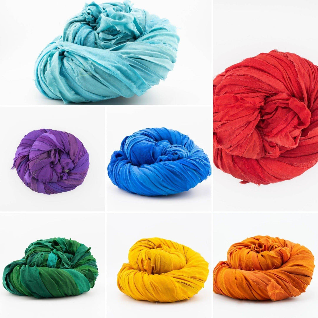 Bundles of fabric strips in various colors arranged in a grid on a white background.