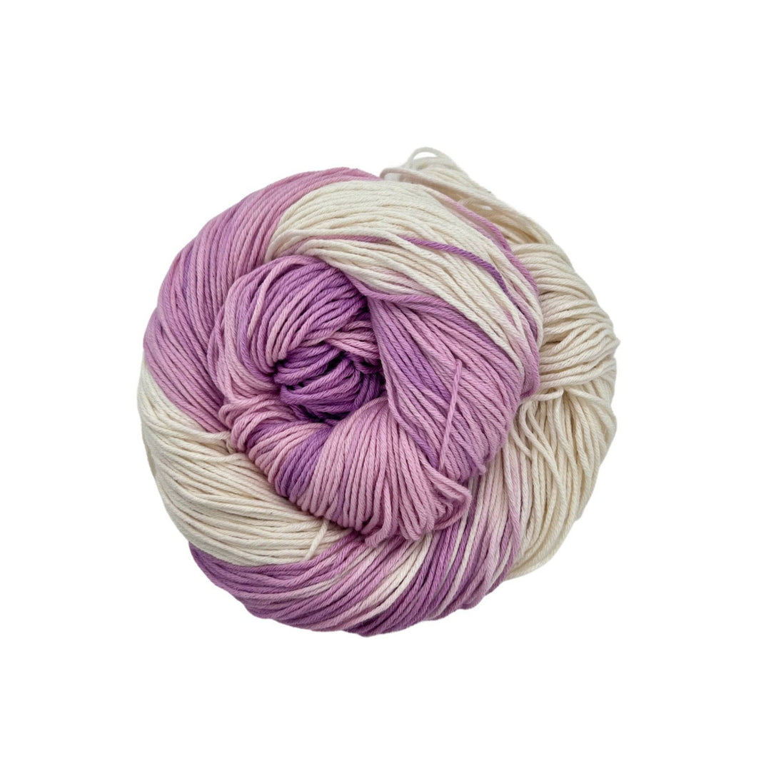 Light purple,pink and white yarn on a white background. 100% Organic Pima Cotton DK Weight