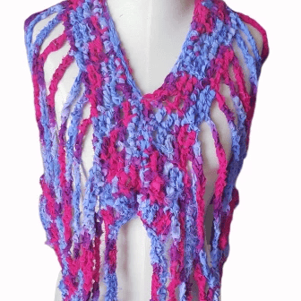Purple and pink crocheted top on a white mannequin on a white background