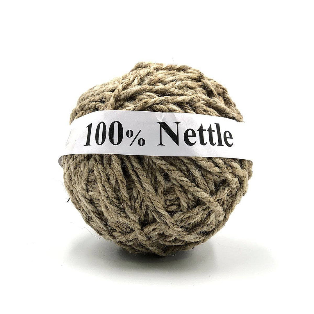 Yarn ball of 3-ply Nettle Undyed on a white background