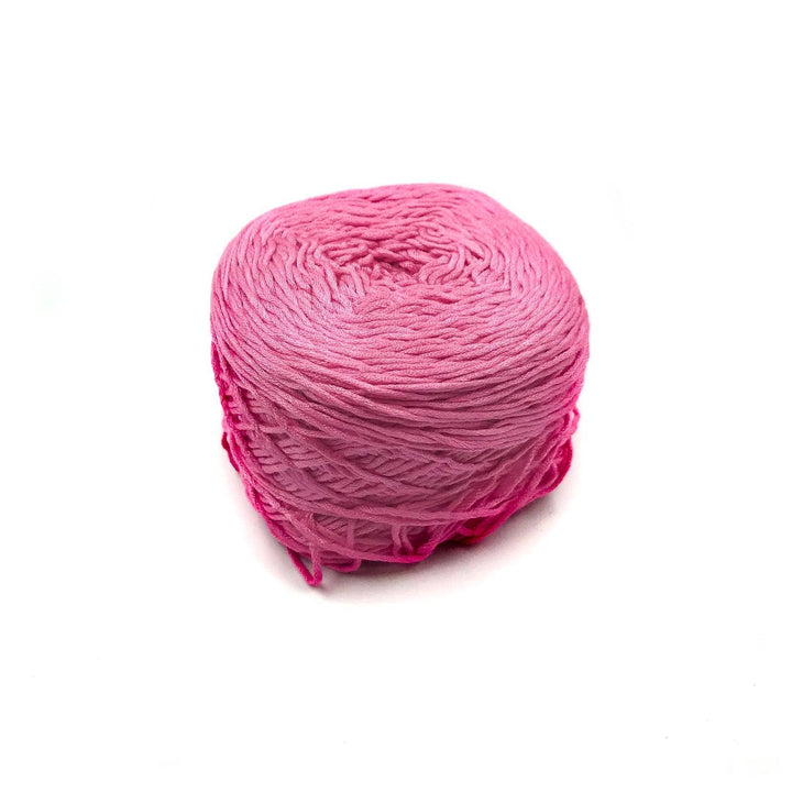 Viscose & Cotton Baby Yarn cake in Orchid (pink) on a white background