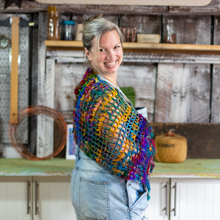 girl in overalls QuadraMesh Crochet Shawl Kit