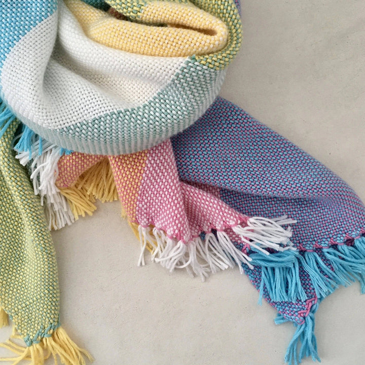multicolored blanket on a white background