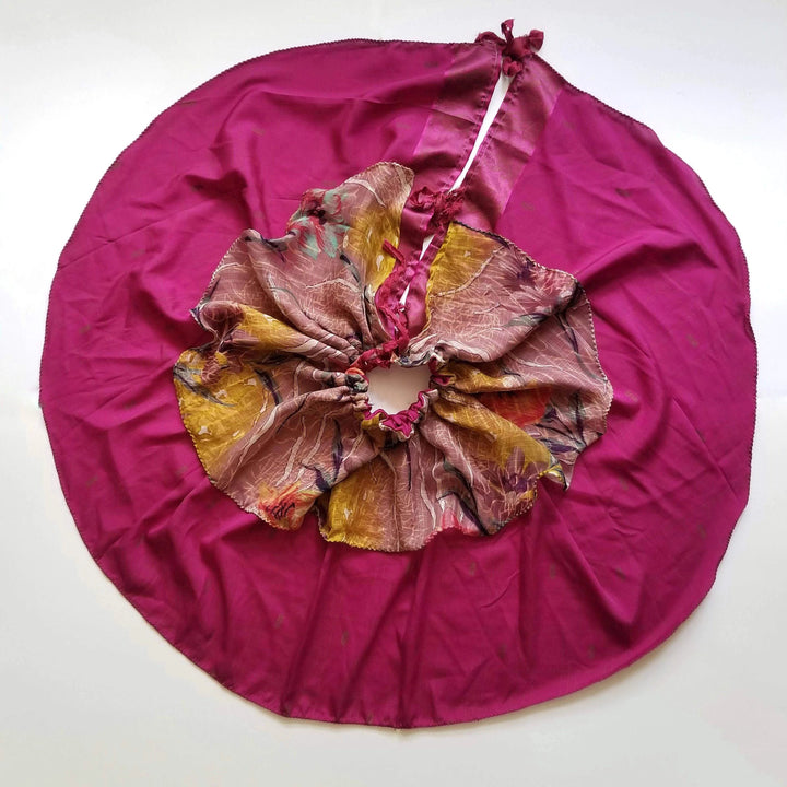Pink tree skirt on a white background