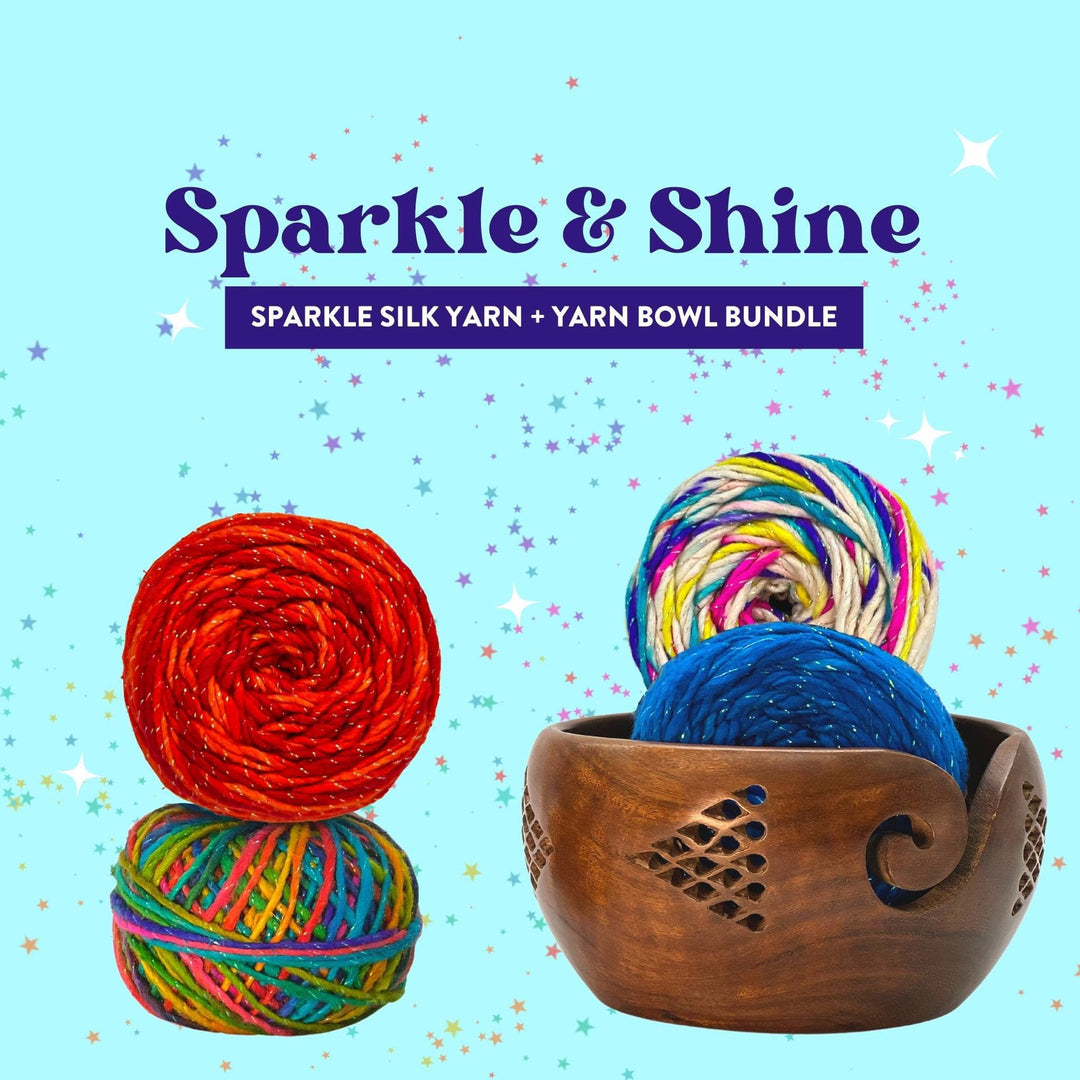 4 skeins of sparkle worsted weight silk and geometric wooden yarn bowl in front of a light teal background. Purple text reads "Sparkle & shine! Sparkle Silk Yarn and Yarn Bowl Bundle" white / pastel rainbow sparkle graphics on yarn to accent sparkle.