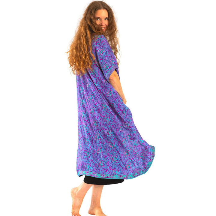 model wearing blue and purple duster]