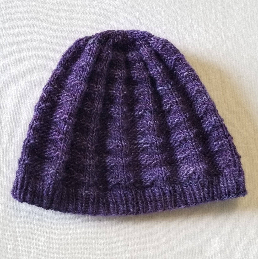 Purple hat a white background