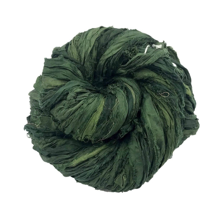 a skein of dark green ribbon yarn on a white background