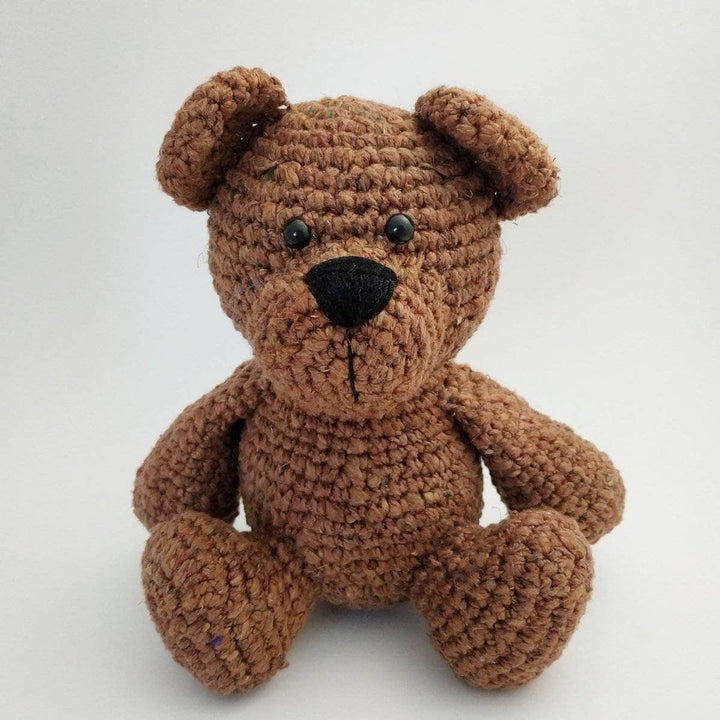 Brown Bear Amigurumi Crochet stuffed animal sitting on a white background