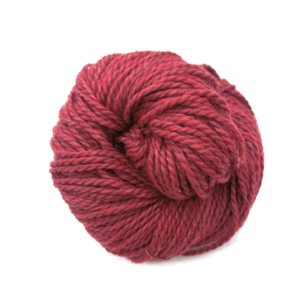 Red yarn on white background