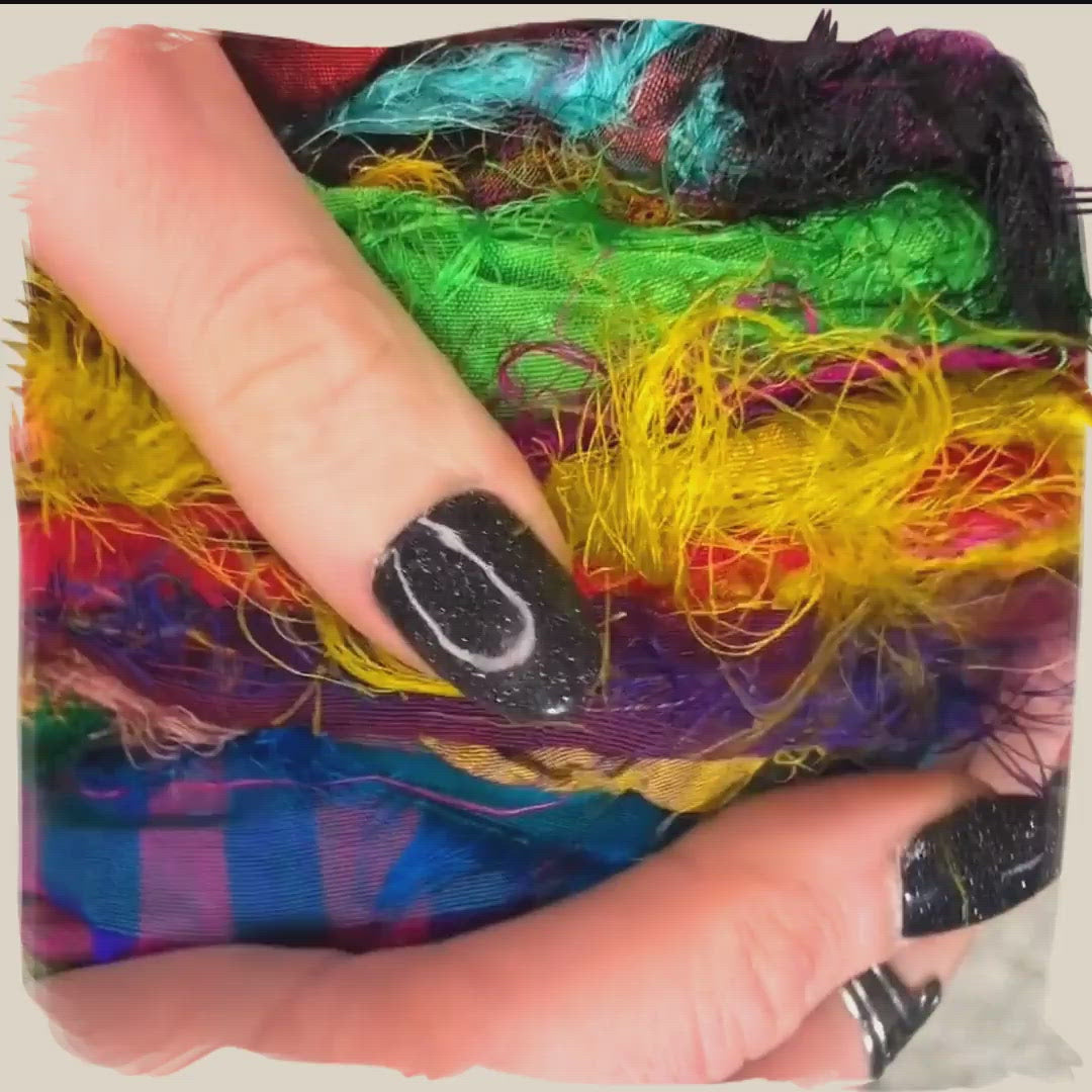 Short video showing the texture of tibet jewels recycled sari silk ribbon yarn