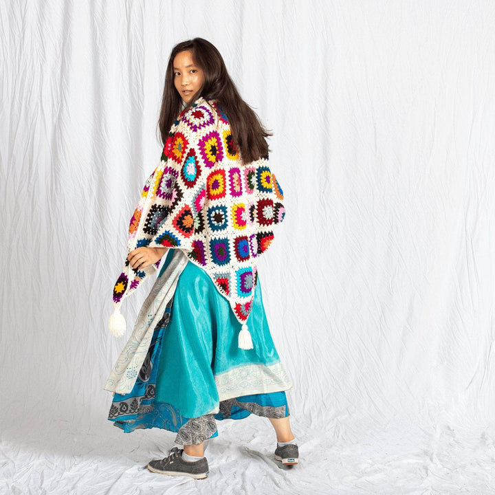 Cape Cod Granny Square Shawl with girl wearing blue skirt
