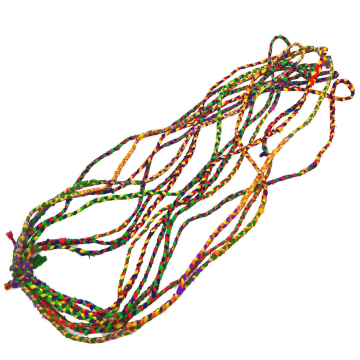 choti sari silk ribbon yarn in retro rainbow in front of a white background.