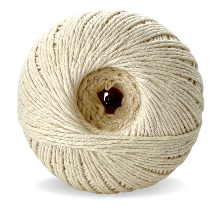 Skein of circulo natural cotton 4/8 (undyed) in front of a white background.