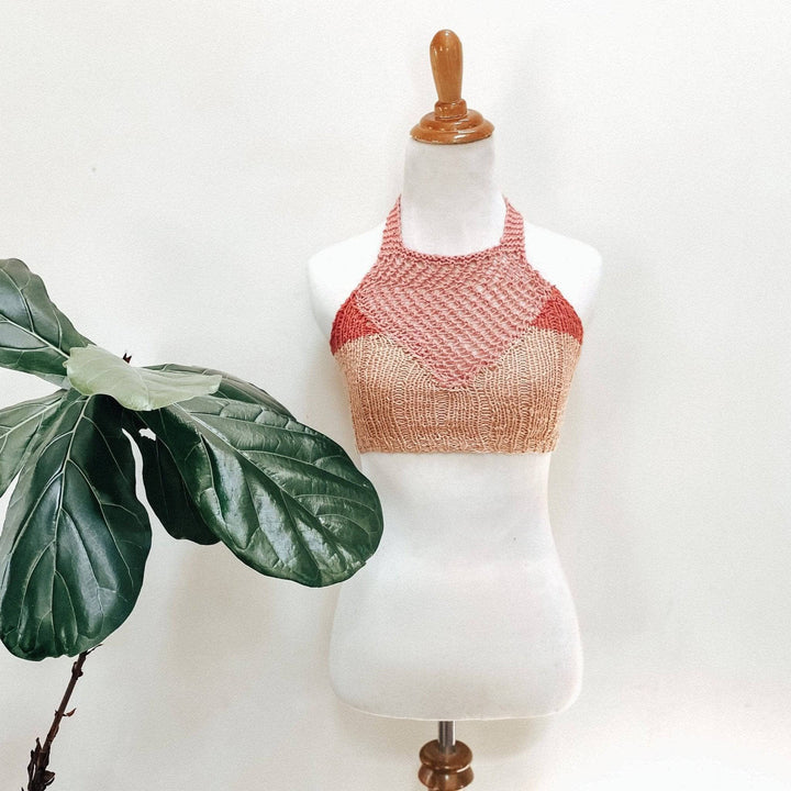 front view of a mannequin wearing a pink bralette