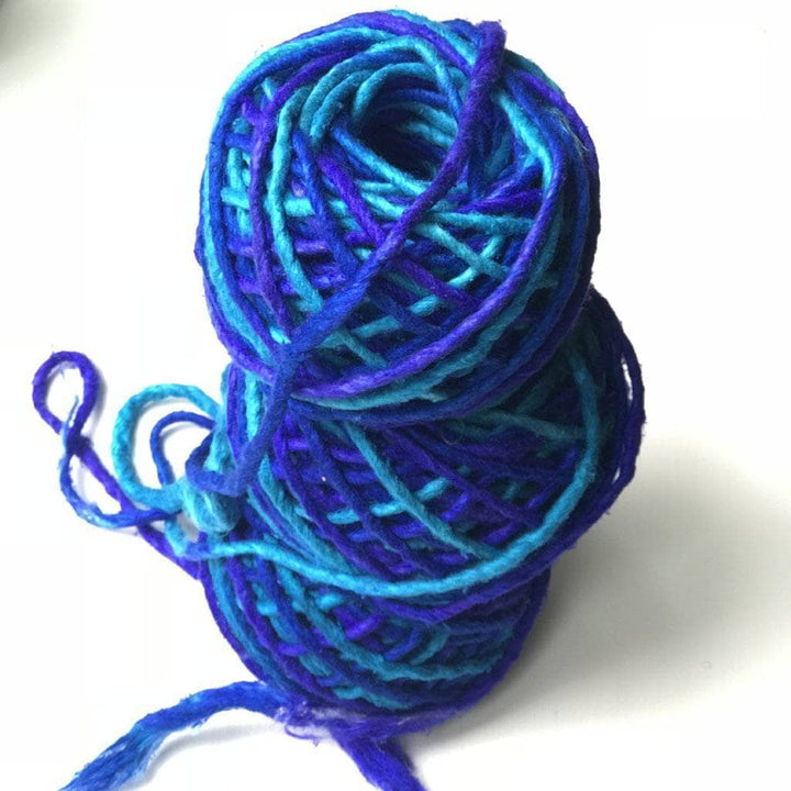 Super Bulky Recycled Silk Yarn in blue on a white backround