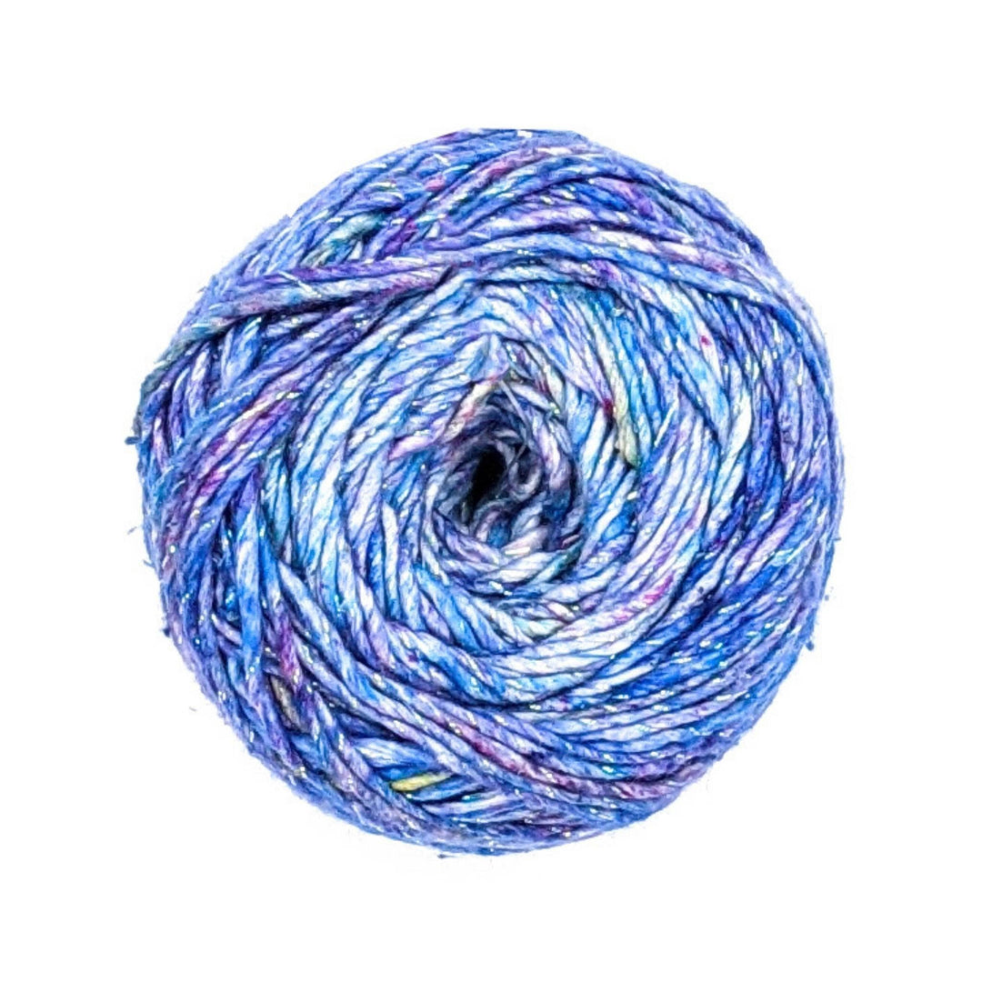 Sparkle tonal blue and purple worsted weight silk yarn in front of a white background. 
