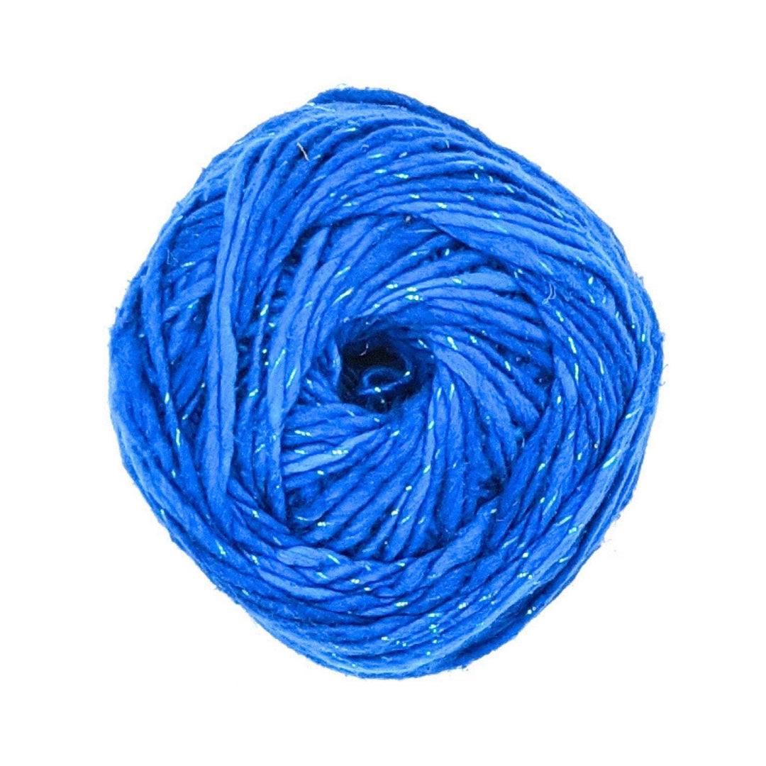 Cake of sparkle worsted weight silk roving yarn in the colorway classic blue (solid medium blue) in front of a white background. 
