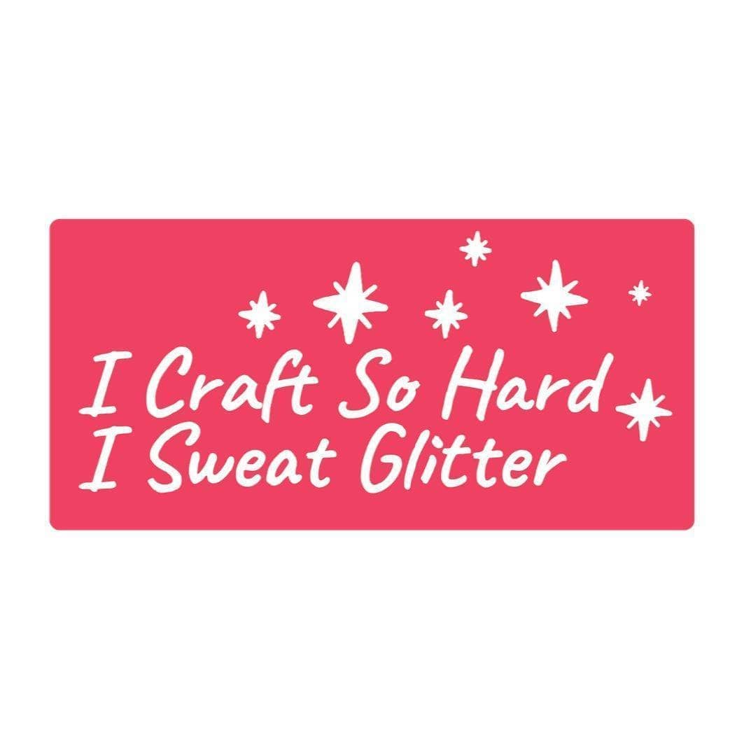 Pink rectangle sticker that reads I craft so hard i sweat glitter with little glitter pieces in white. 