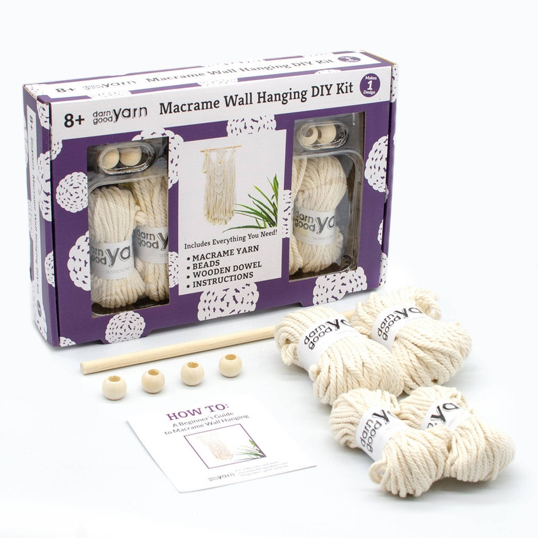 macrame wall hanging kit with all items showing in front of a white background.