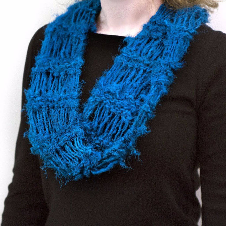 woman wearing the blue Elongated Cowl Kit