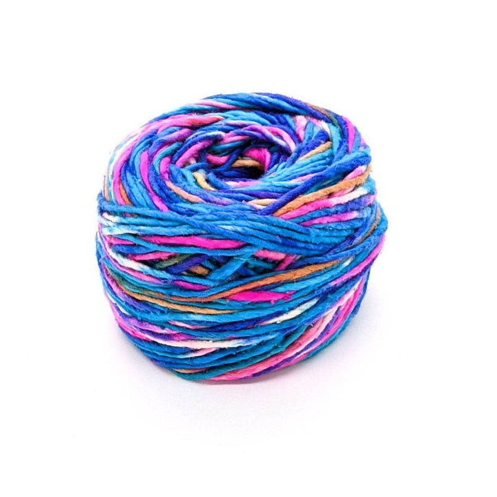 A cake of blue, pink, white, tan, and purple yarn on a white background